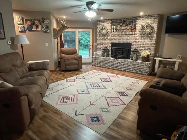 3923 Scenic Bluff Road Thomson, IL 61285 - Photo 14 of 28 a view of a livingroom with furniture window and a fireplace