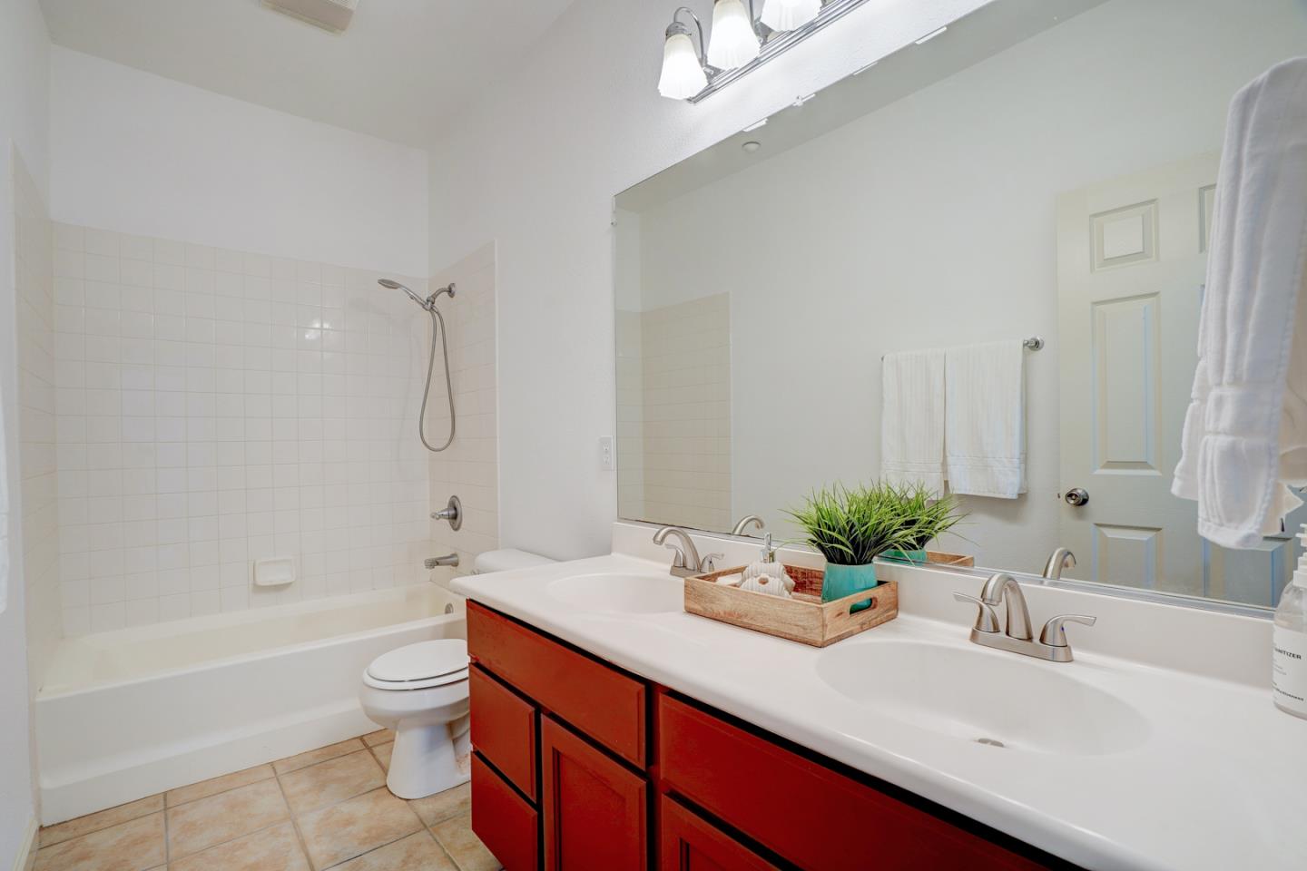 3546 Sequoia Common Fremont, CA 94536 - Photo 14 of 25 a bathroom with a sink a toilet and bathtub