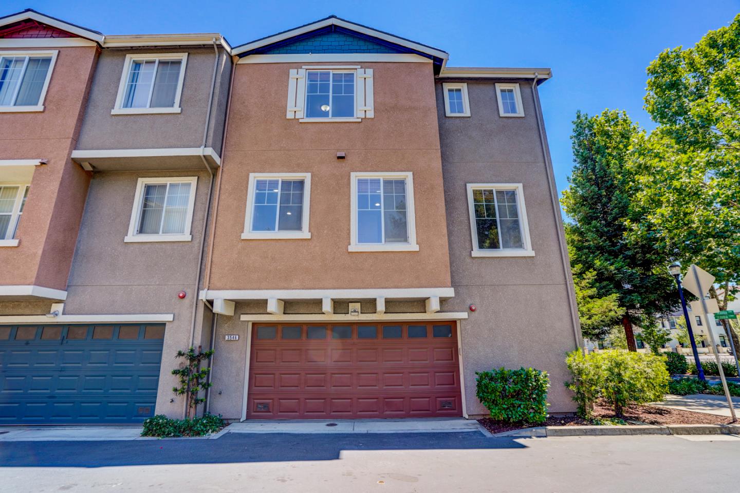 3546 Sequoia Common Fremont, CA 94536 - Photo 17 of 25 a front view of a house with a yard