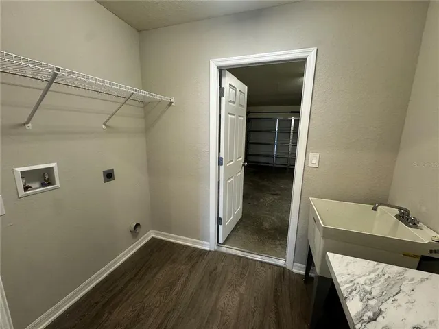a bathroom with a sink and shower