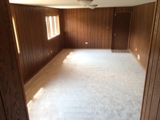8714 Raintree Road Tinley Park, IL 60487 - Photo 12 of 13 an empty room with windows