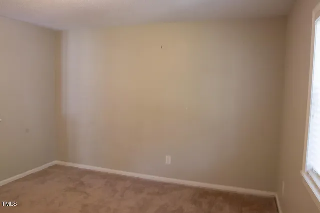 a bathroom with a sink vanity and a mirror