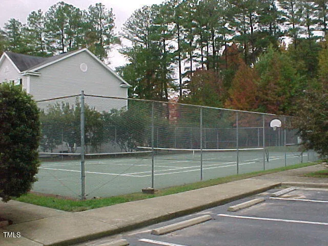a view of a swimming pool and a chairs