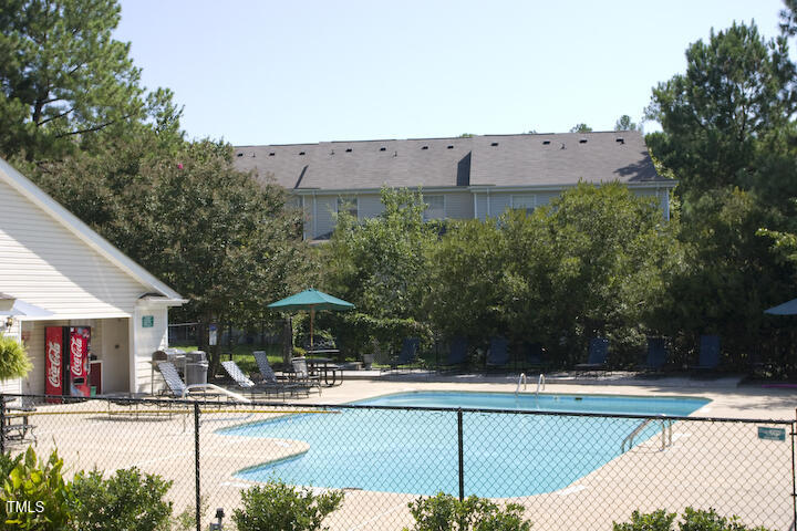243 Schultz Street Chapel Hill, NC 27514 - Photo 21 of 21 a view of a swimming pool and a chairs