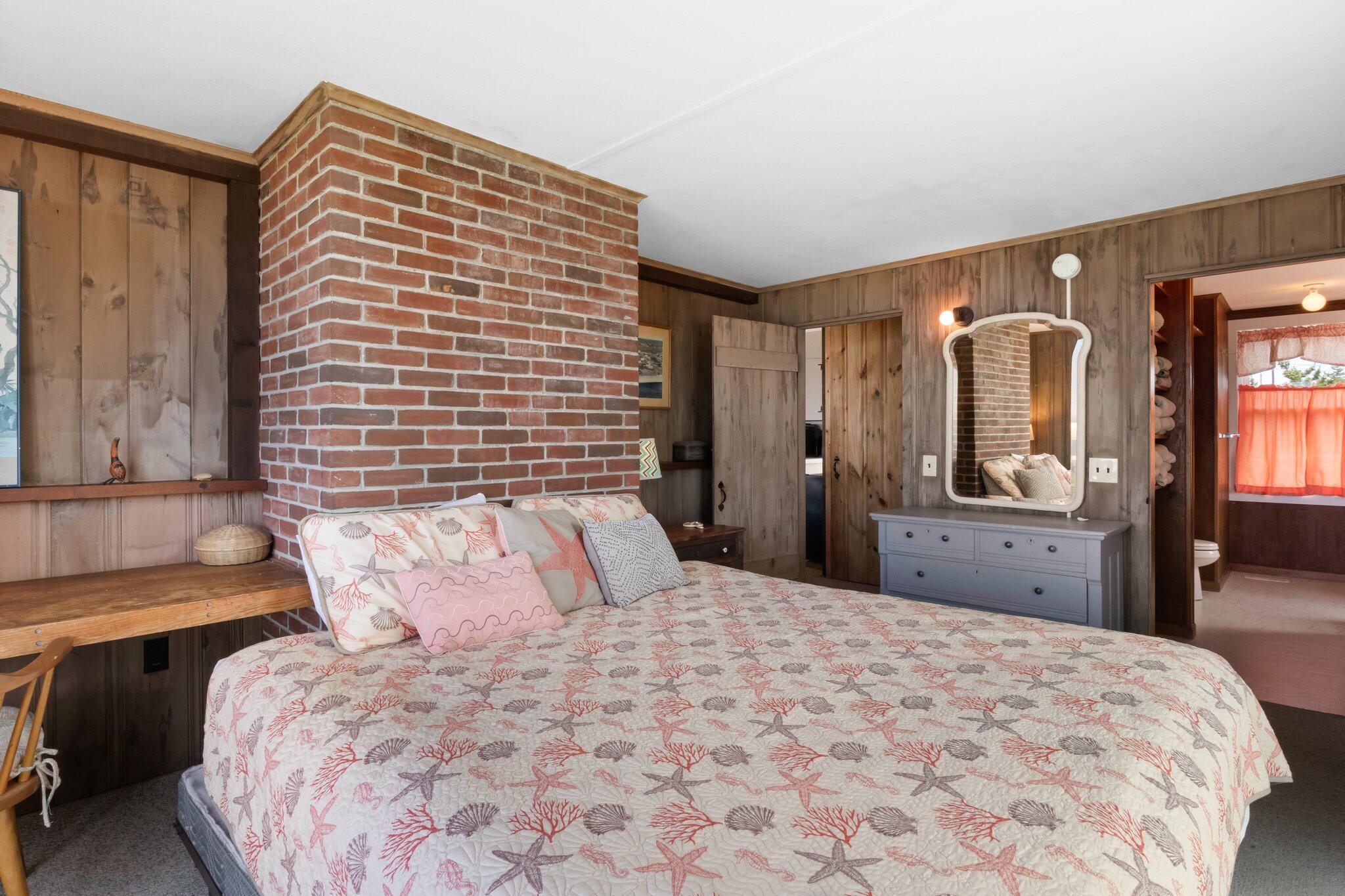 4 Bay View Path Truro, MA 02666 - Photo 16 of 71 a bedroom with a large bed and a dresser