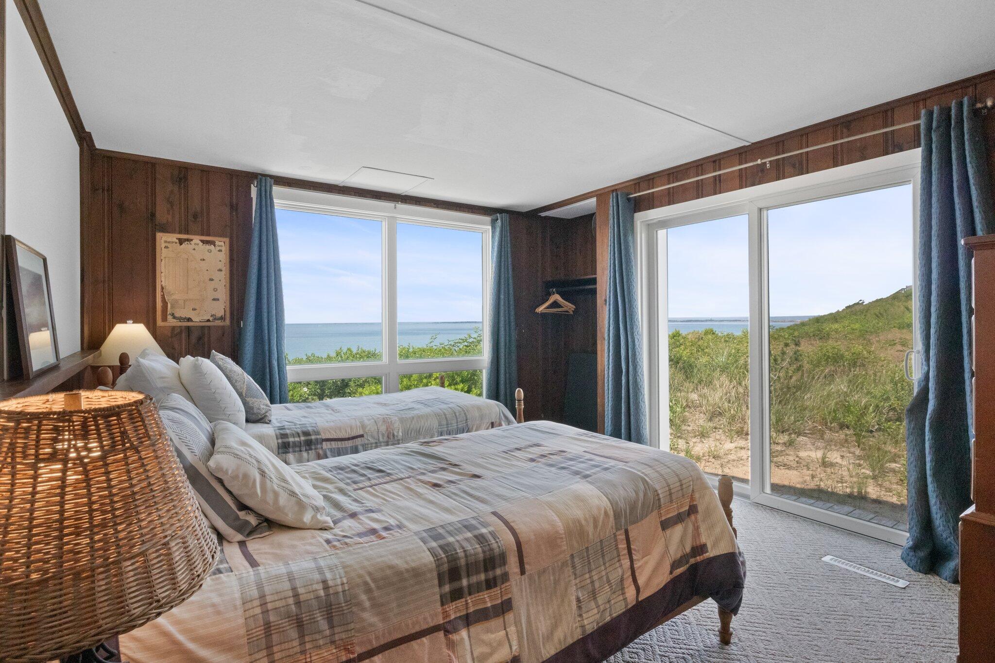4 Bay View Path Truro, MA 02666 - Photo 20 of 71 a bedroom with a bed and a large window