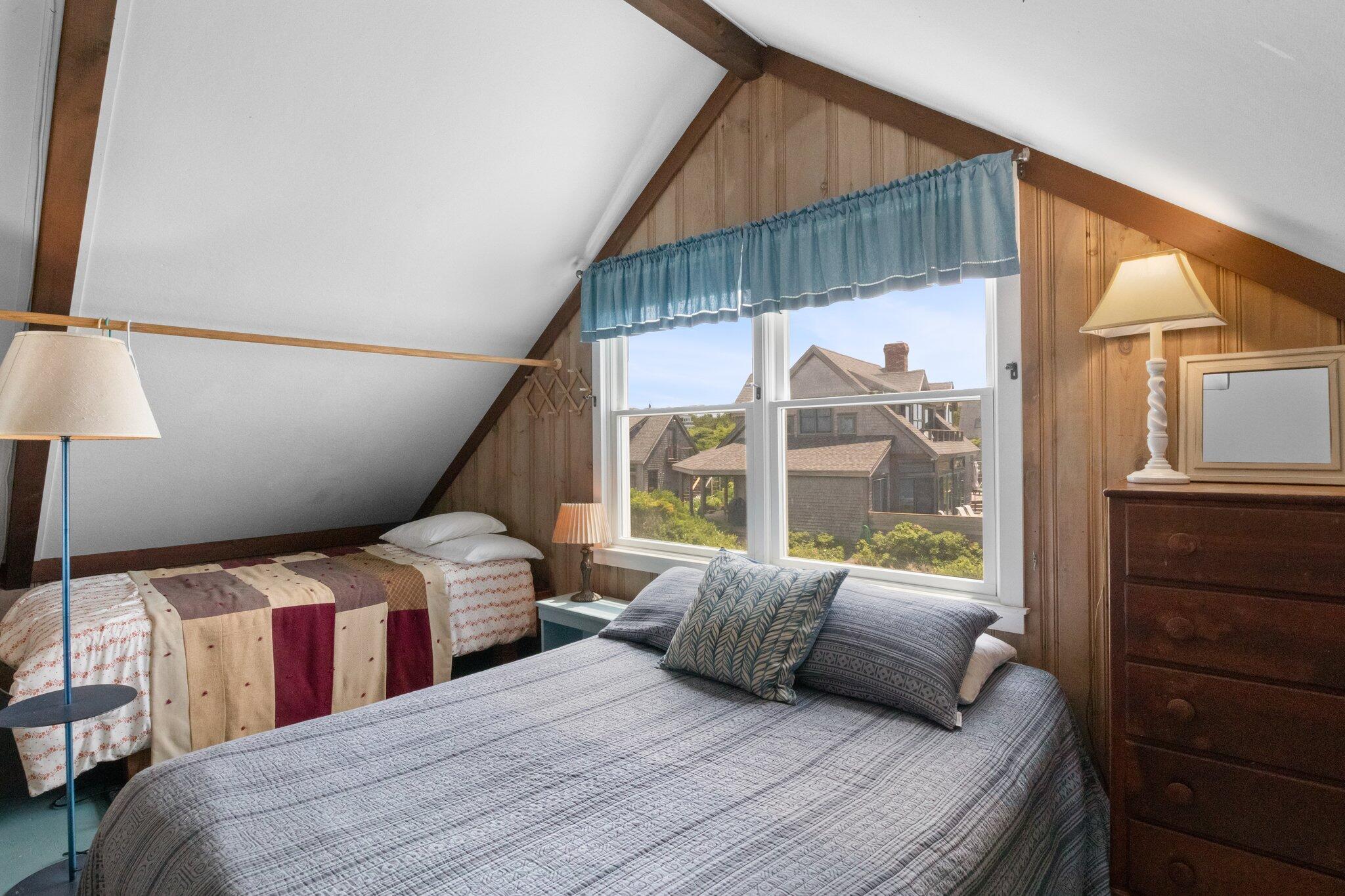 4 Bay View Path Truro, MA 02666 - Photo 29 of 71 a bedroom with two beds and a large window