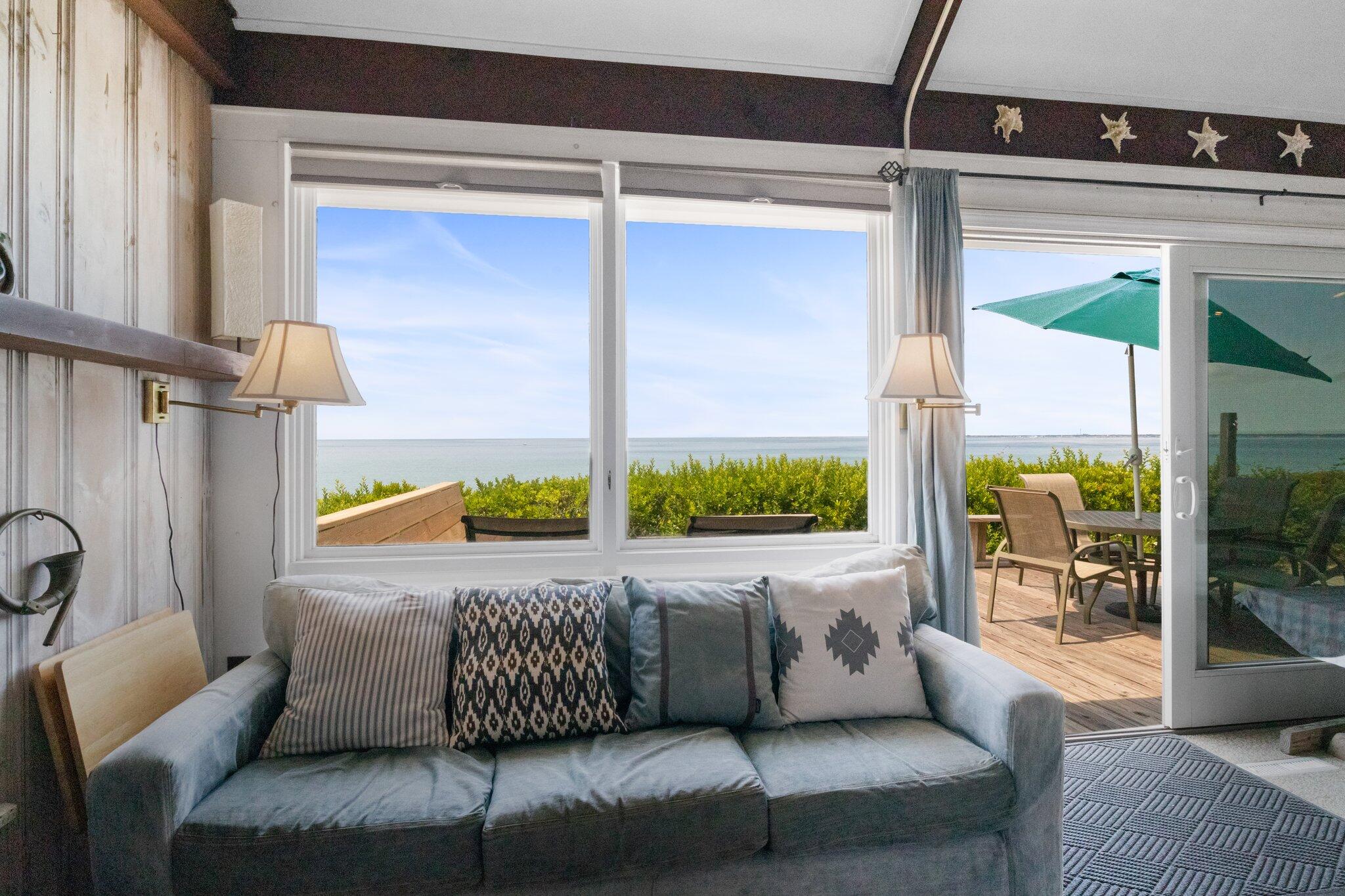 4 Bay View Path Truro, MA 02666 - Photo 3 of 71 a balcony with furniture and a potted plant