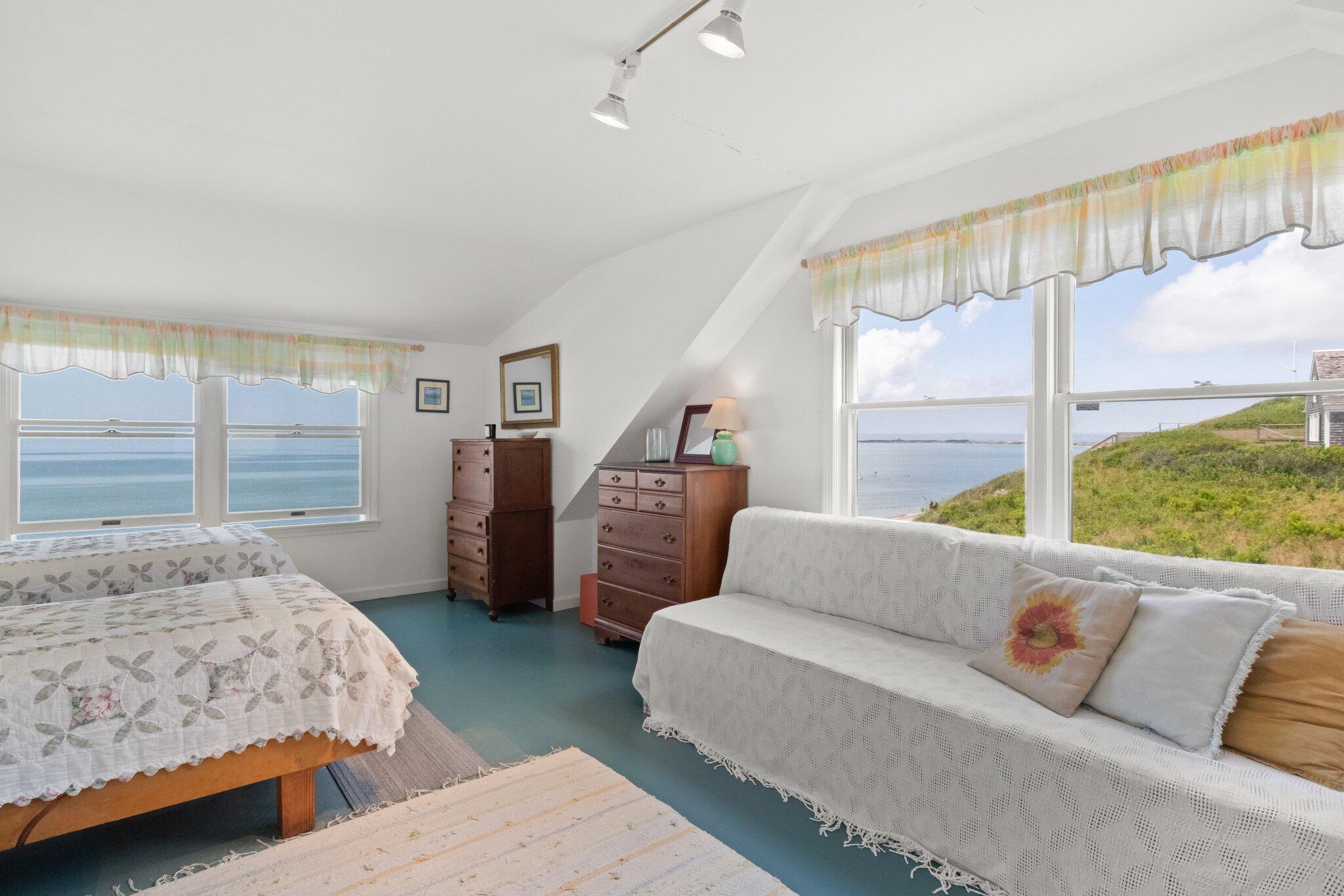 4 Bay View Path Truro, MA 02666 - Photo 31 of 71 a bedroom with two beds and large windows
