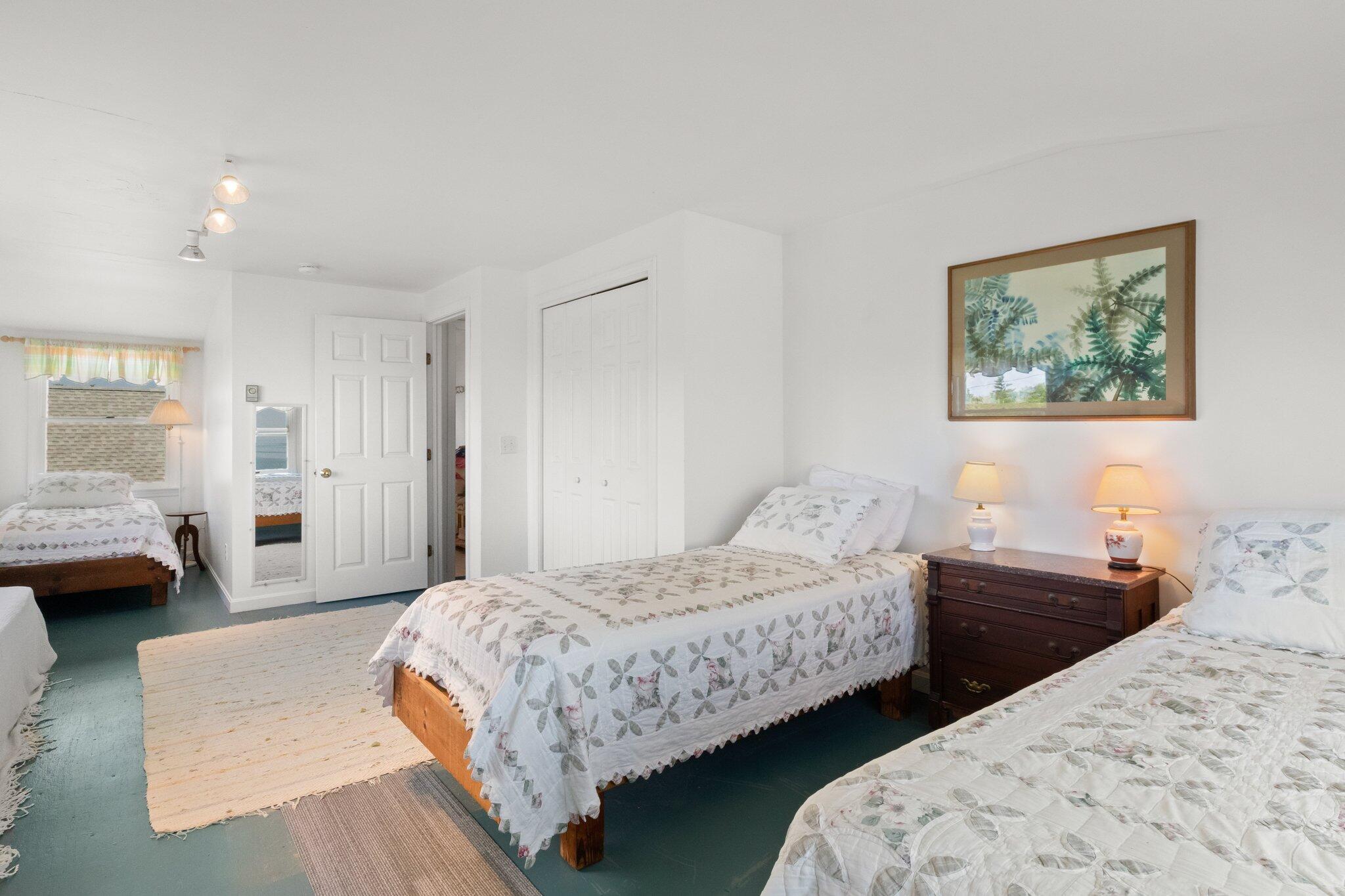 4 Bay View Path Truro, MA 02666 - Photo 33 of 71 a bedroom with two beds and painted walls