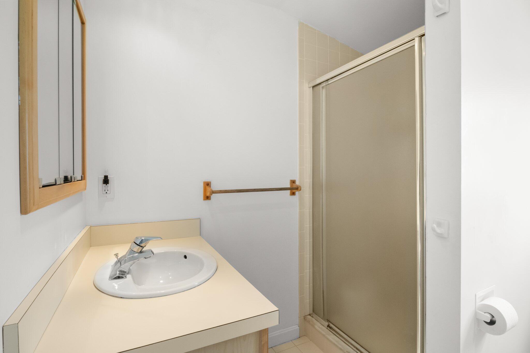 4 Bay View Path Truro, MA 02666 - Photo 34 of 71 a bathroom with a sink and a mirror