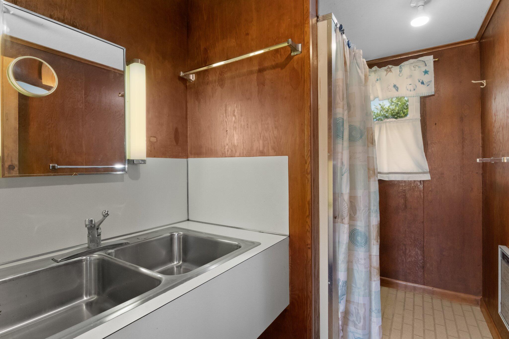 4 Bay View Path Truro, MA 02666 - Photo 39 of 71 a close view of a sink and cabinets
