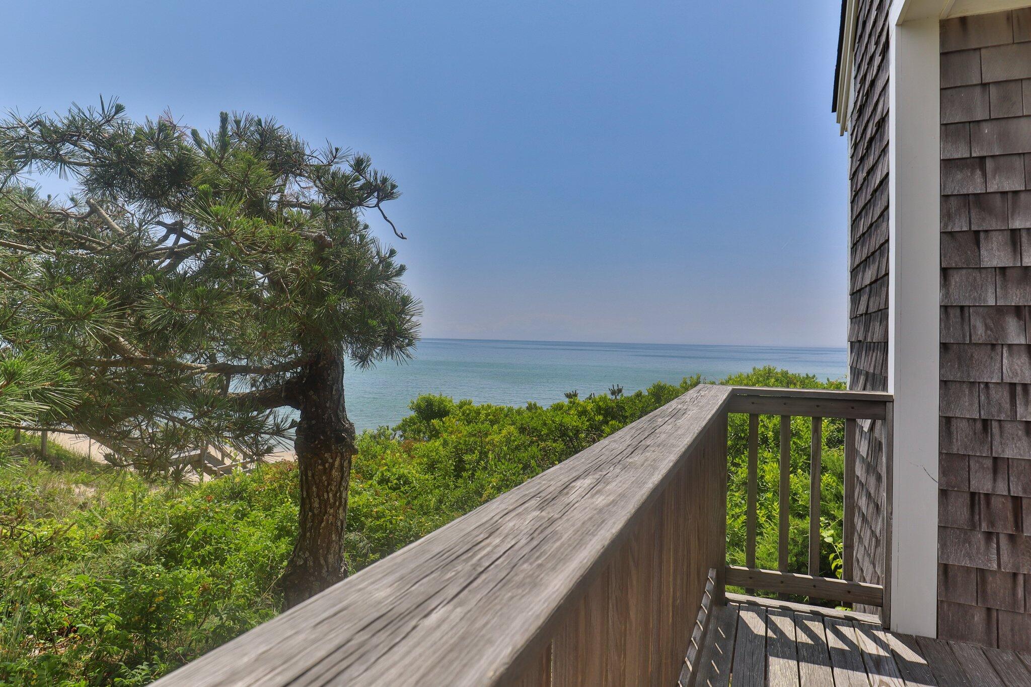 4 Bay View Path Truro, MA 02666 - Photo 48 of 71 a city view from a balcony with outdoor space