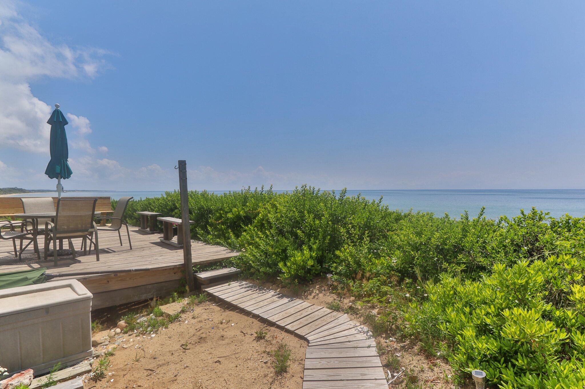 4 Bay View Path Truro, MA 02666 - Photo 53 of 71 a view of a swimming pool with a patio