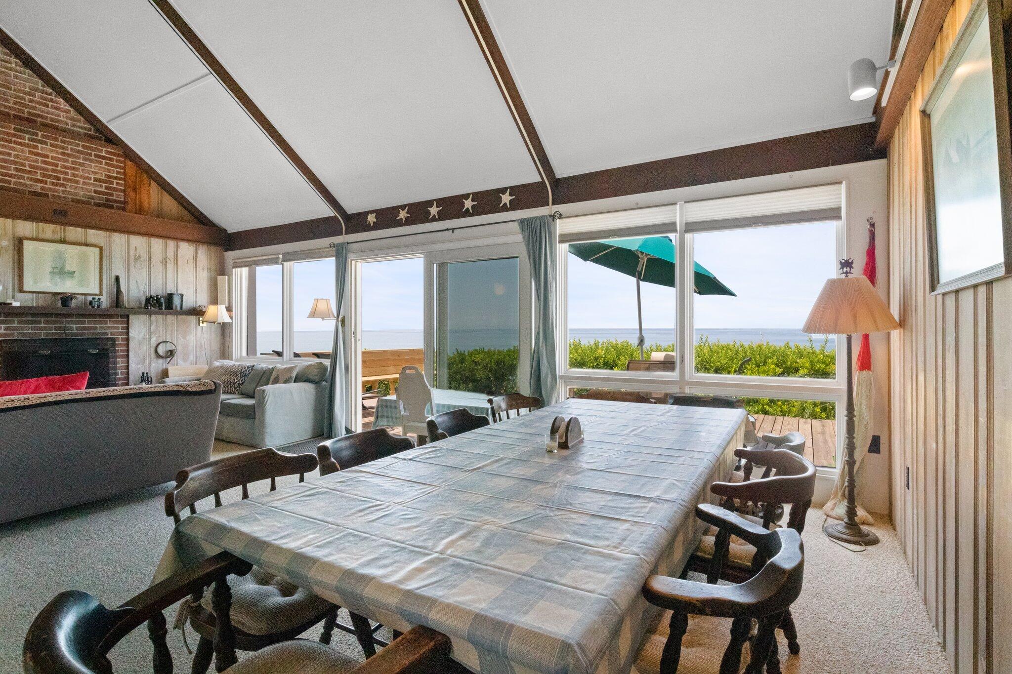 4 Bay View Path Truro, MA 02666 - Photo 7 of 71 a view of a dining room with furniture window and outside view