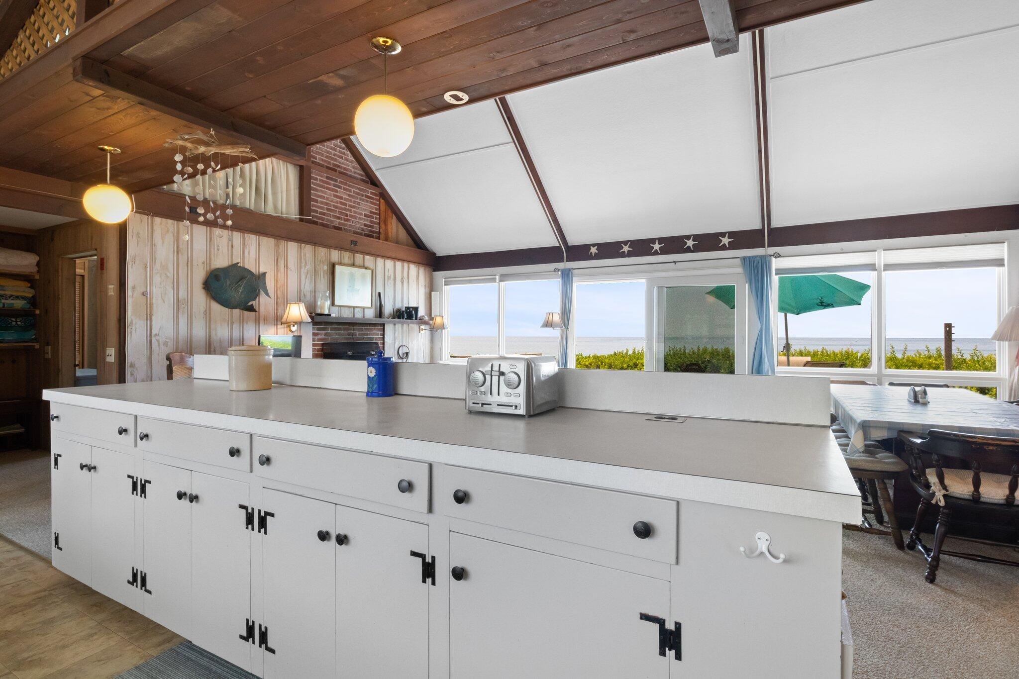 4 Bay View Path Truro, MA 02666 - Photo 10 of 71 a kitchen with a sink and cabinets