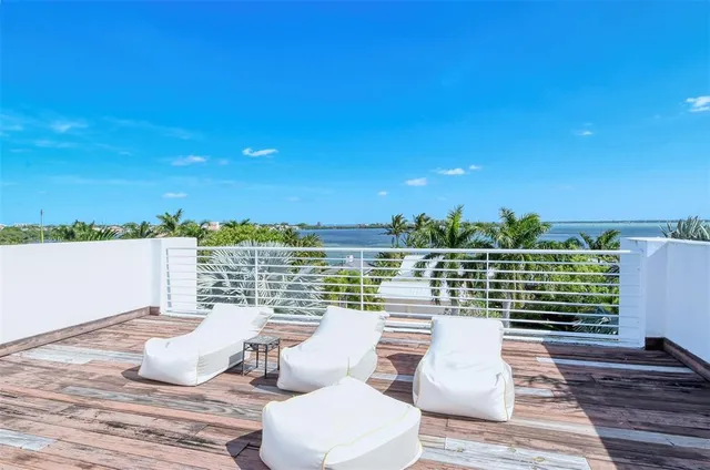 a bathroom with a double vanity sink mirror and shower