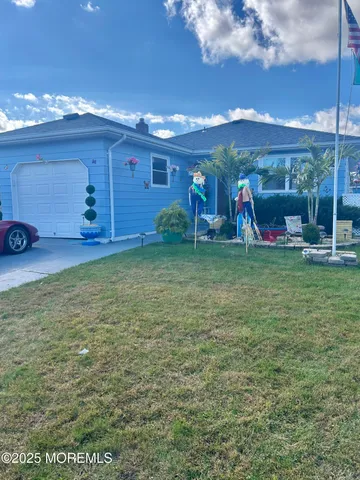a view of a chairs in front of house