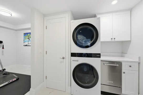 a room with gym equipment and a window