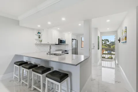$699,000 | 501 South Seas Drive, Unit 203, Jupiter, FL 33477