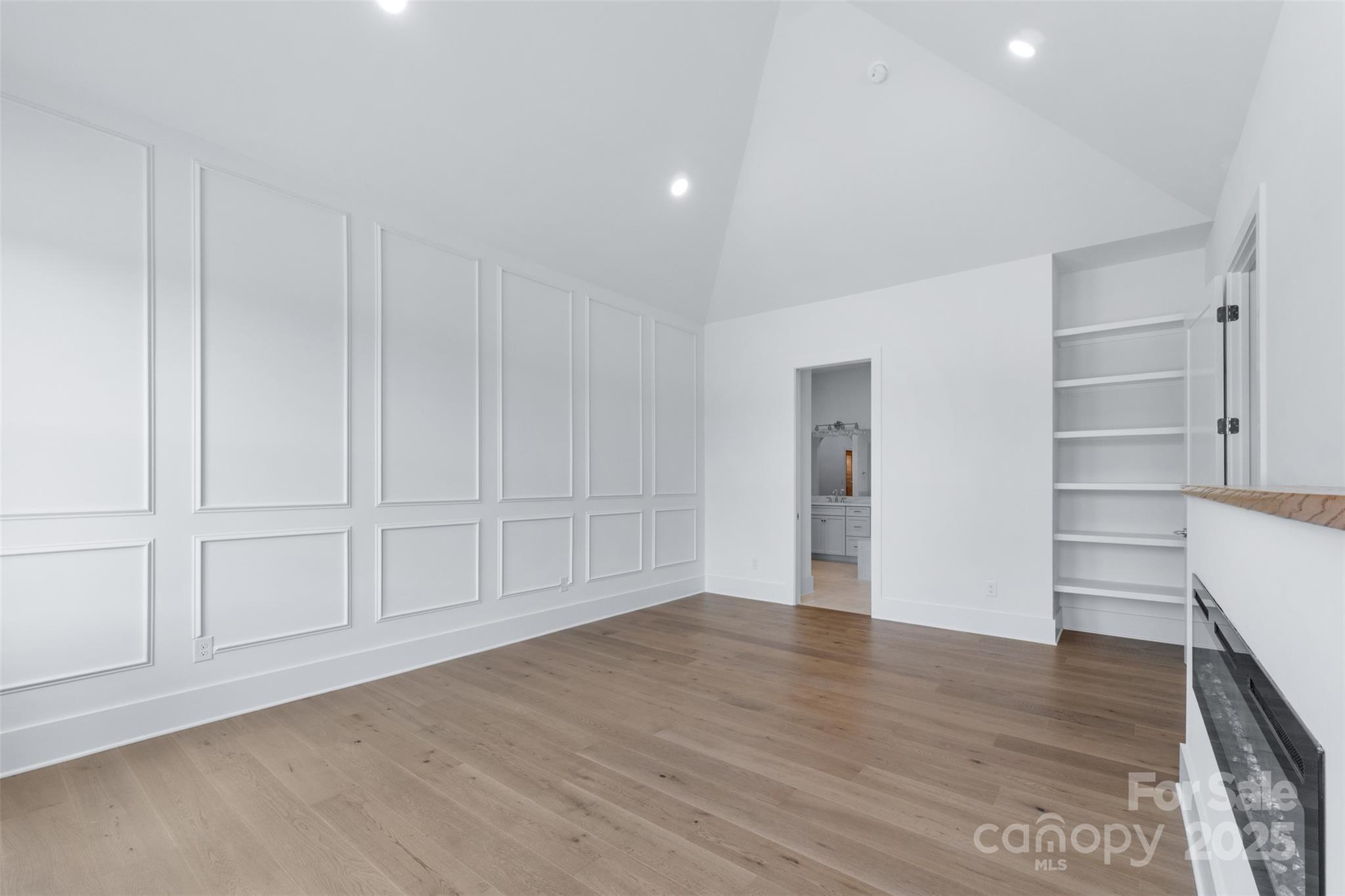 2296 Bridgewater Road, Unit 2 Rock Hill, SC 29730 - Photo 13 of 31 a view of an empty room with wooden floor and closet