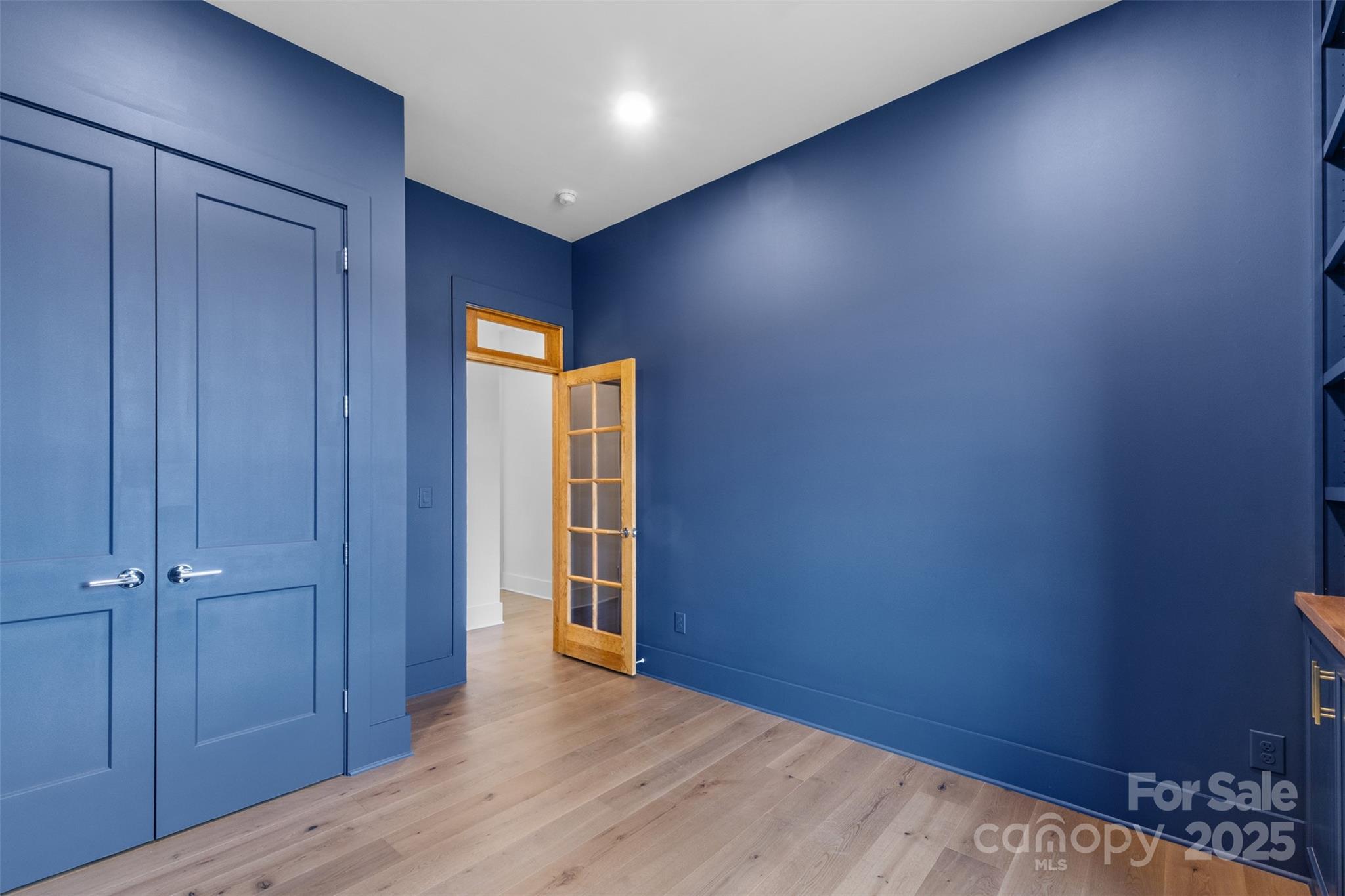 2296 Bridgewater Road, Unit 2 Rock Hill, SC 29730 - Photo 18 of 31 an empty room with wooden floor and closet