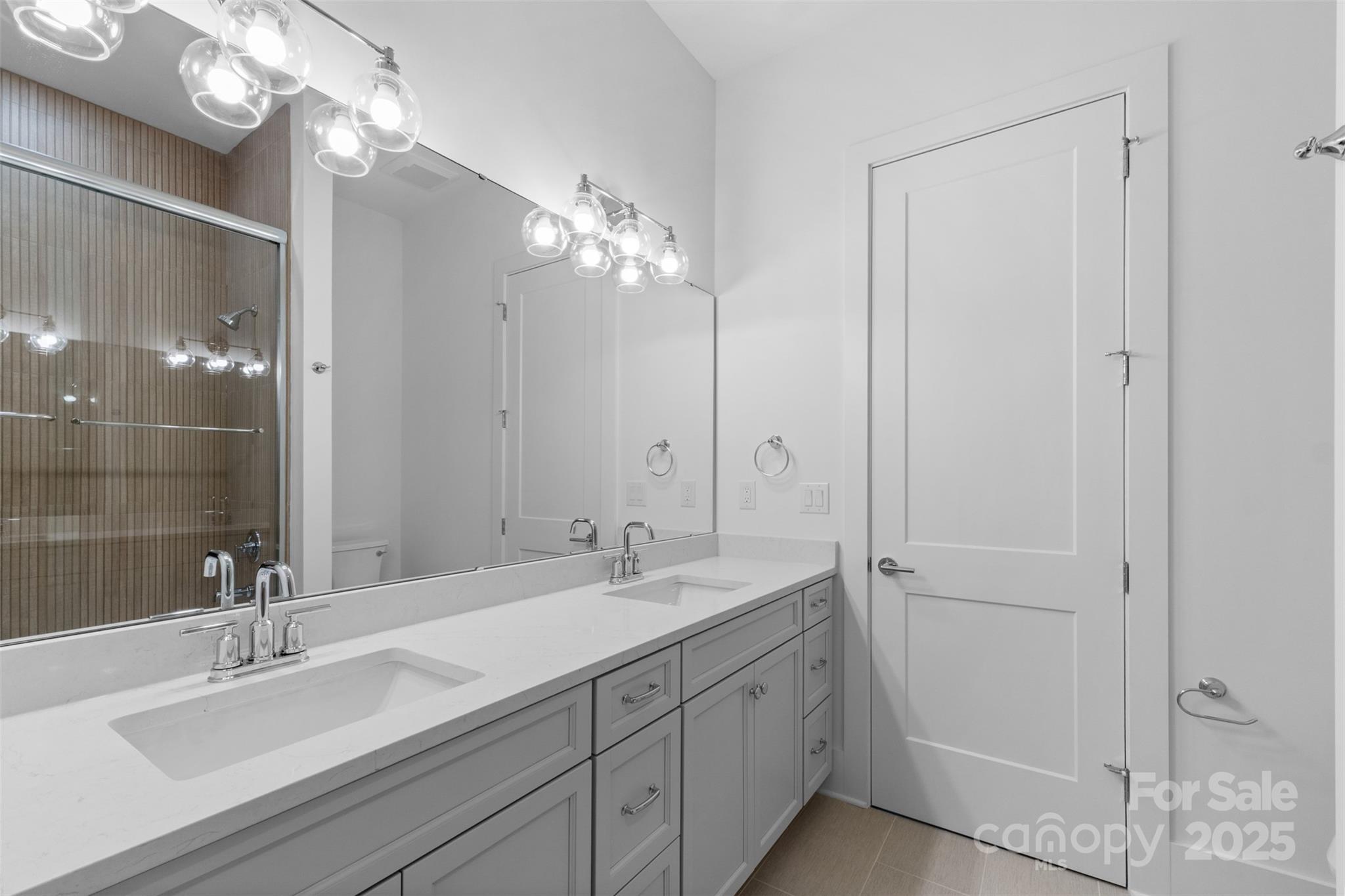 2296 Bridgewater Road, Unit 2 Rock Hill, SC 29730 - Photo 22 of 31 a bathroom with double vanity sinks and a mirror