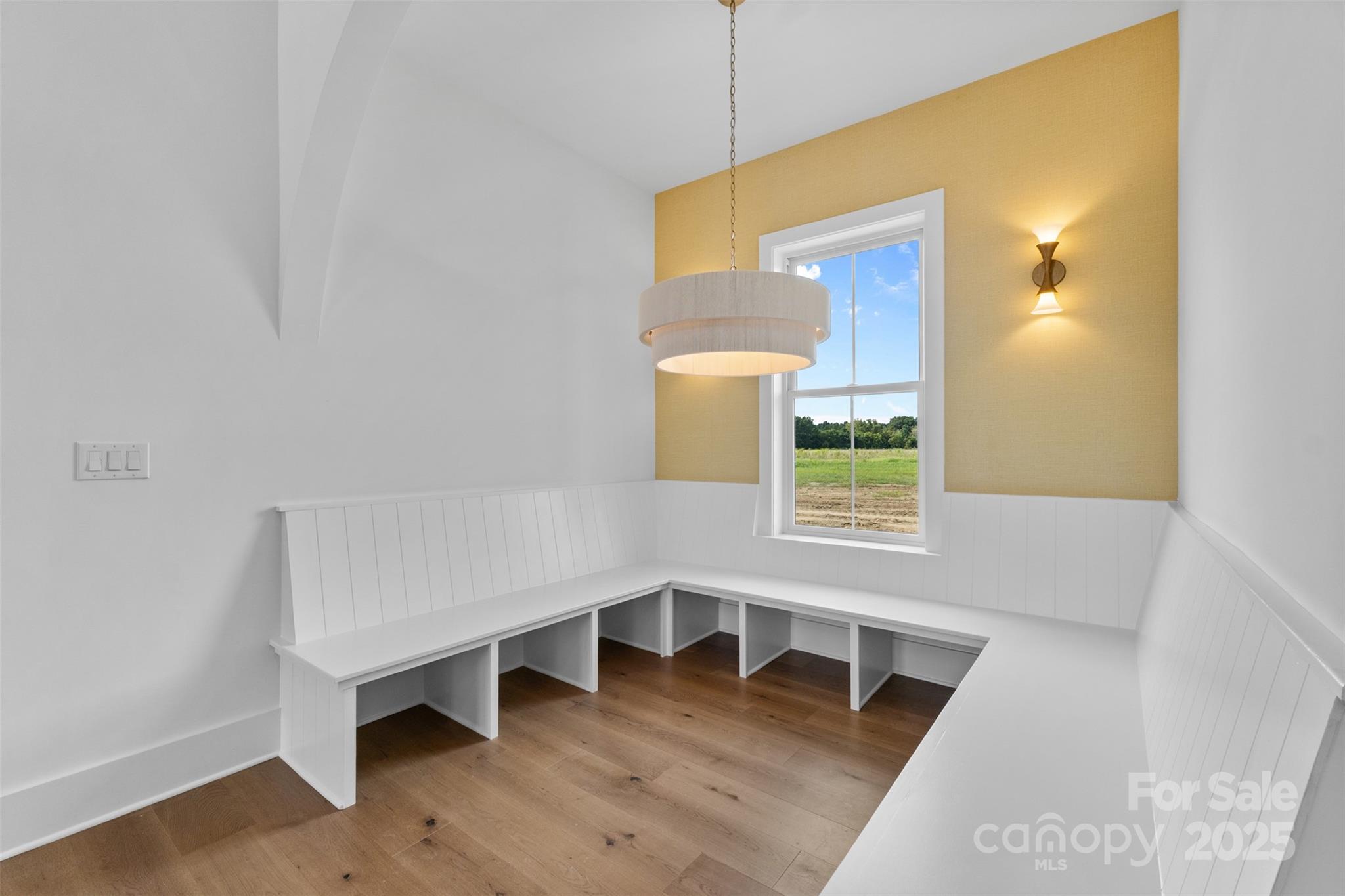 2296 Bridgewater Road, Unit 2 Rock Hill, SC 29730 - Photo 5 of 31 a view of an empty room with a window and wooden floor