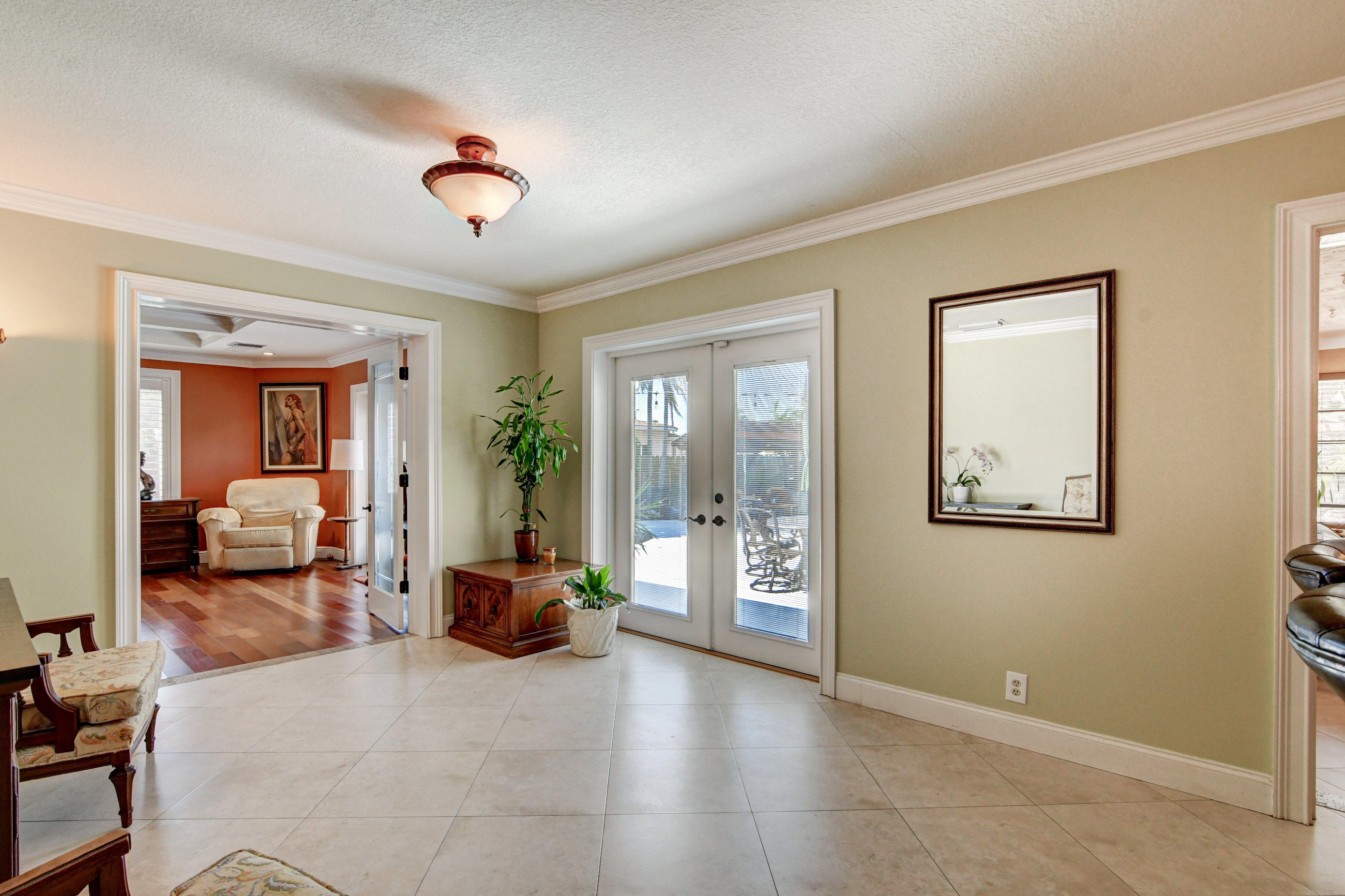 1720 Southwest 9th Street Boca Raton, FL 33486 - Photo 21 of 75 a living room with furniture and large windows