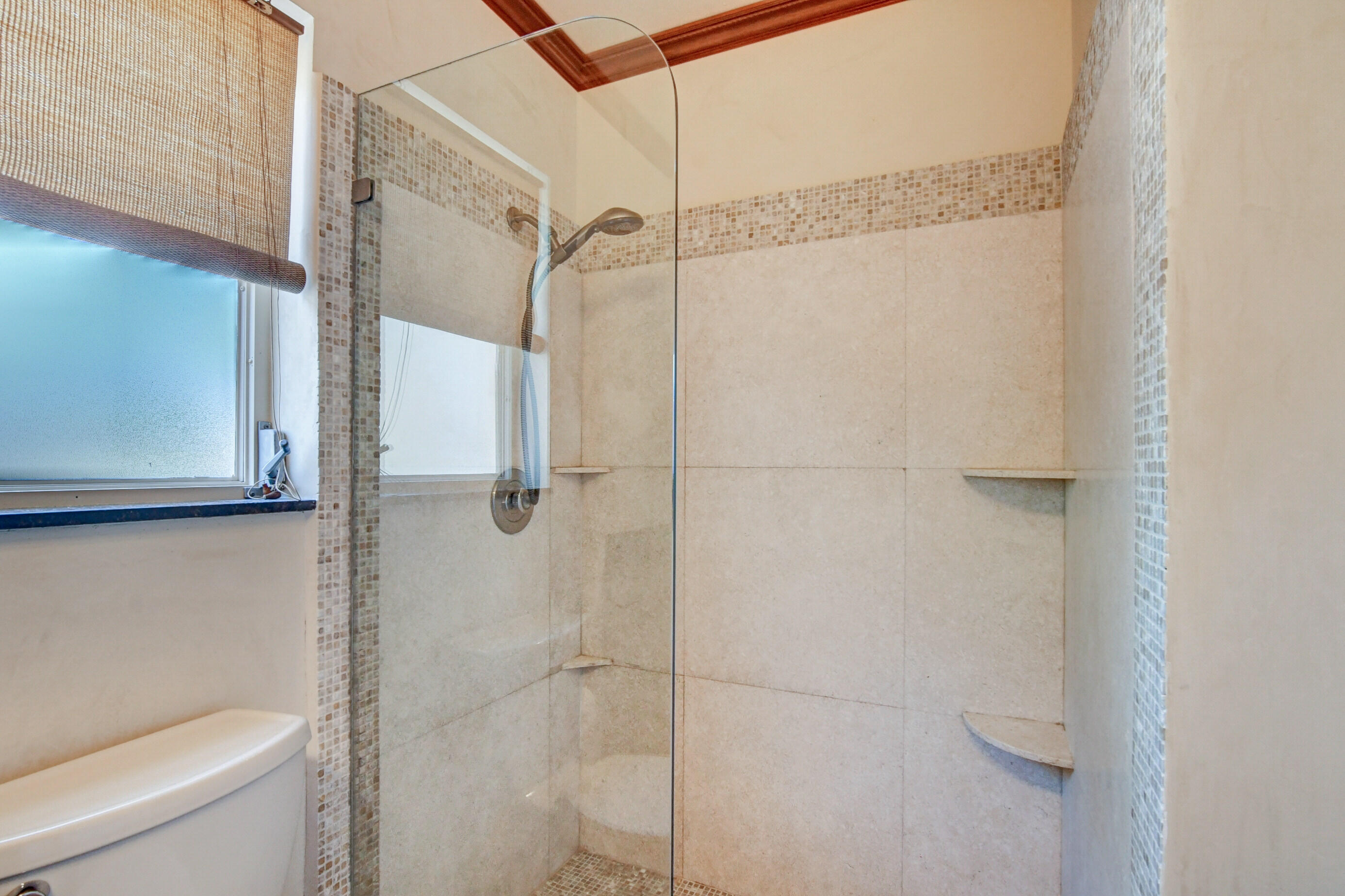1720 Southwest 9th Street Boca Raton, FL 33486 - Photo 53 of 75 a bathroom with a shower and toilet