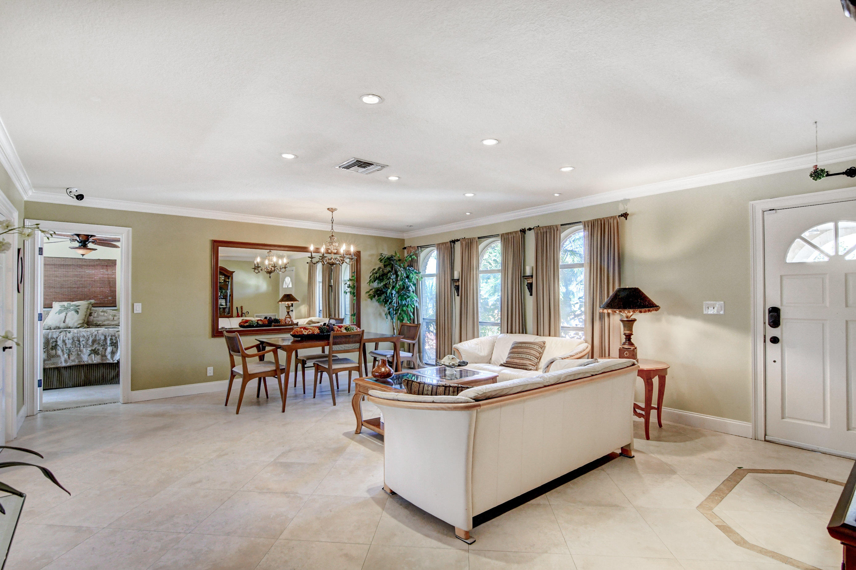 1720 Southwest 9th Street Boca Raton, FL 33486 - Photo 9 of 75 a living room with furniture and a large window