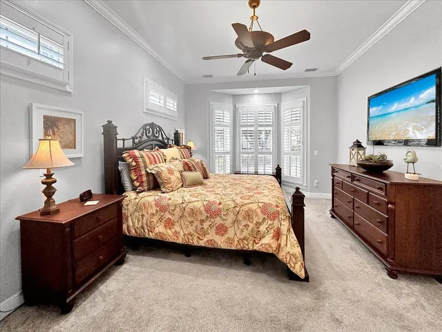 a view of an entryway with wooden floor and windows