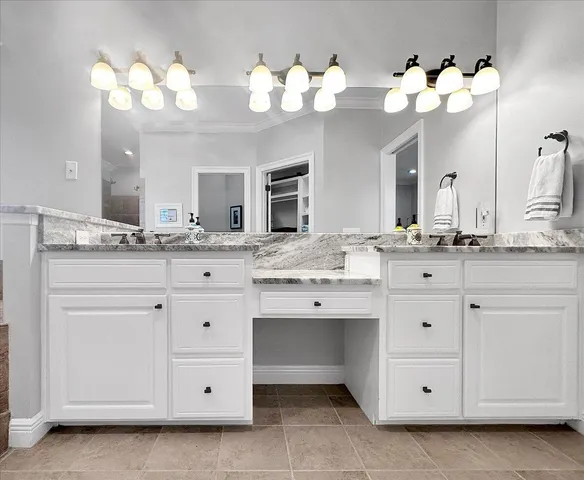 a bed room with a bed and a dresser