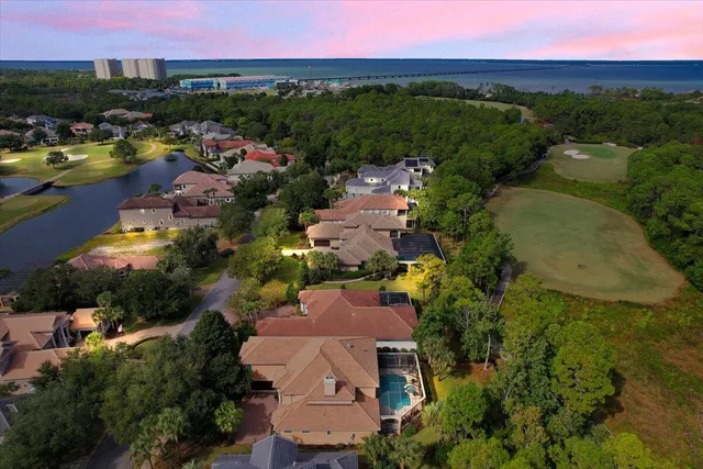 a swimming pool with outdoor seating and yard