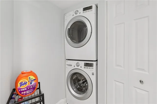 a utility room with dryer and washer