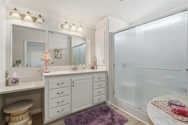 a spacious bathroom with a double vanity sink mirror and toilet