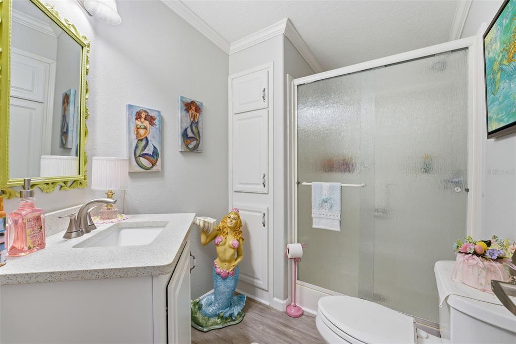 10315 Cortez Road West, Unit 34BV Bradenton, FL 34210 - Photo 21 of 35 a bathroom with a sink toilet and shower