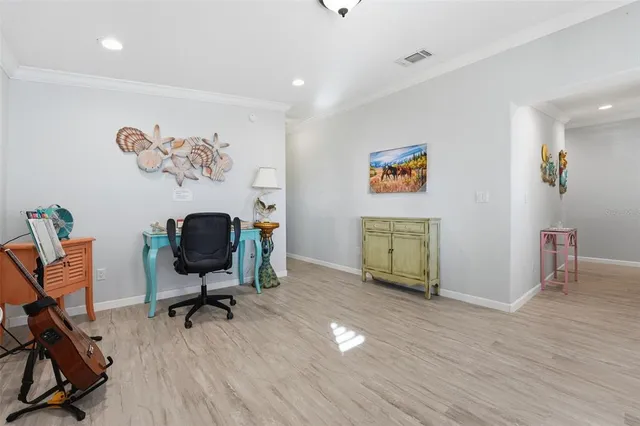 a workspace with furniture and wooden floor