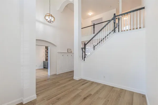 a view of entryway with wooden floor
