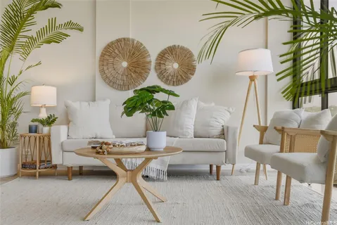 a living room with furniture and a lamp