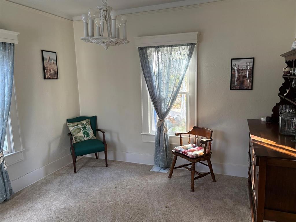 39 Turner Street Clearwater, FL 33756 - Photo 15 of 22 a living room with furniture and a window