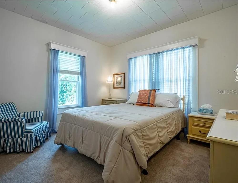 39 Turner Street Clearwater, FL 33756 - Photo 17 of 22 a bedroom with a bed and a window