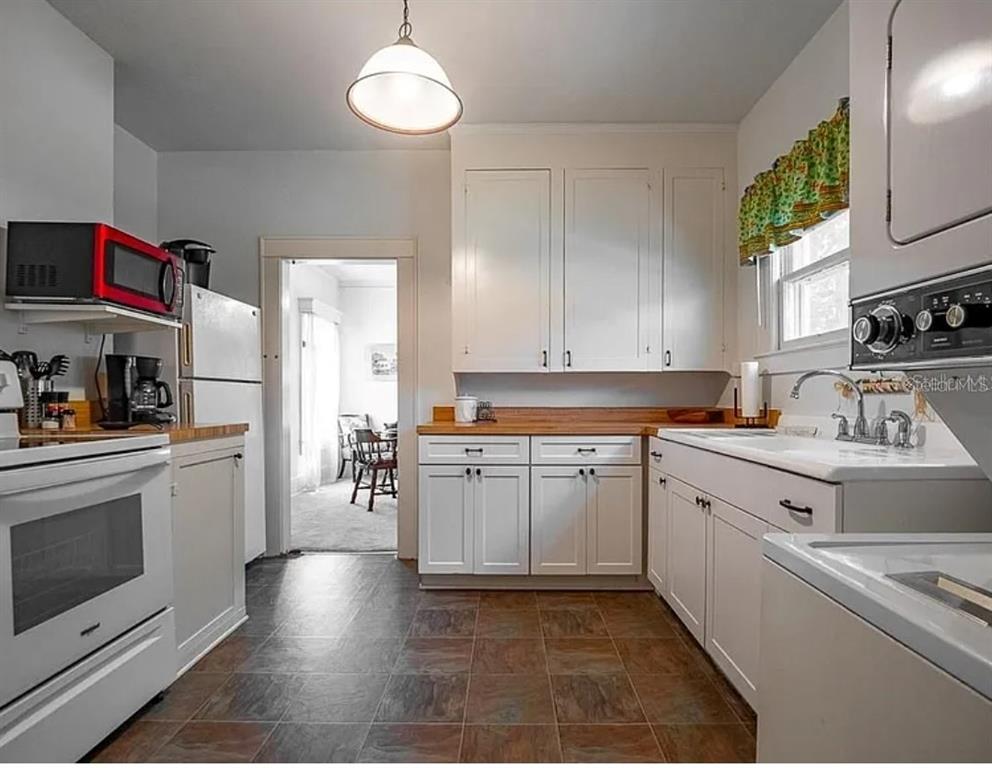 39 Turner Street Clearwater, FL 33756 - Photo 22 of 22 a kitchen with a sink cabinets and window