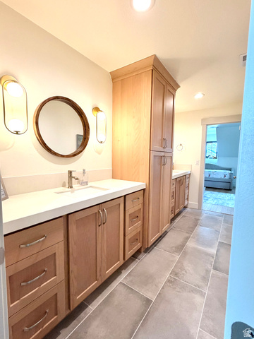 3626 Riverstone Road Mapleton, UT 84664 - Photo 32 of 58 Ensuite bathroom with vanity, recessed lighting, and dark tile patterned floors