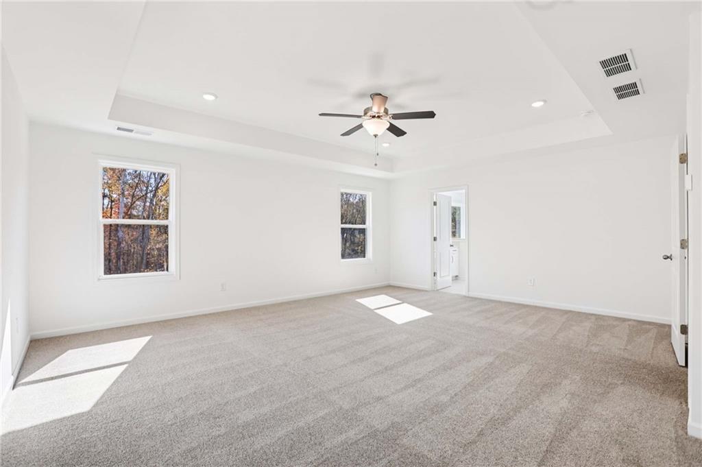 6155 Kismet Road Buford, GA 30518 - Photo 29 of 47 a view of an empty room with a window