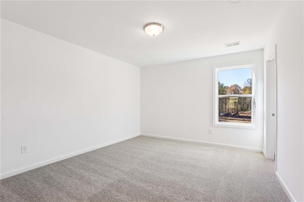 6155 Kismet Road Buford, GA 30518 - Photo 33 of 47 a view of a small space with a window