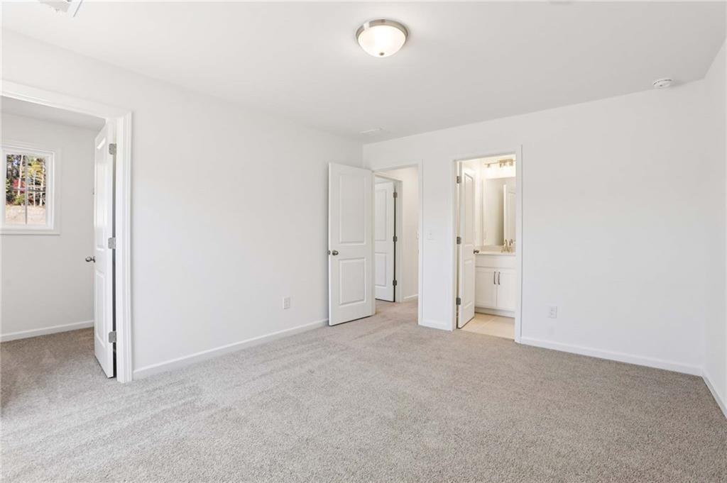 6155 Kismet Road Buford, GA 30518 - Photo 34 of 47 an empty room with closet area