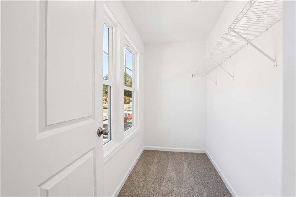 6155 Kismet Road Buford, GA 30518 - Photo 38 of 47 a view of an entryway with staircase