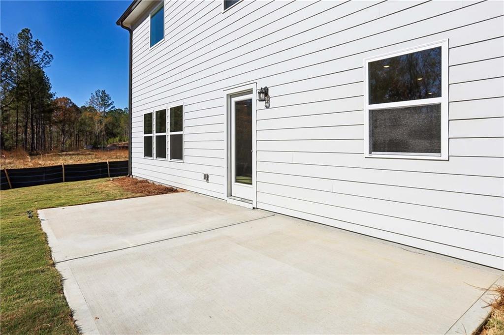 6155 Kismet Road Buford, GA 30518 - Photo 43 of 47 a view of backyard of house