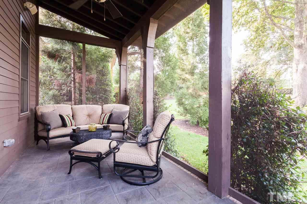 2007 Avery Drive Raleigh, NC 27608 - Photo 22 of 25 The screen porch is located off the family room and overlooks tree-adorned common area which makes this one of the BEST backyards in the neighborhood. From the adjoining alley, you can walk to the neighborhood pool!